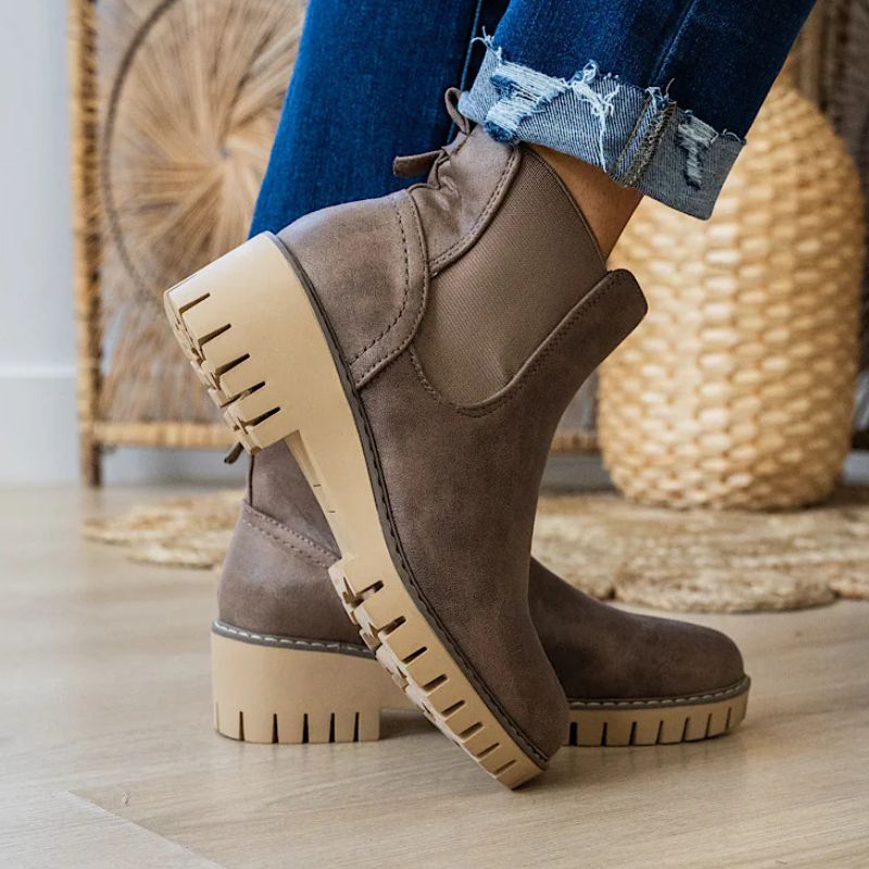 Combining Shorts With Boots: A Perfect Transitional Style